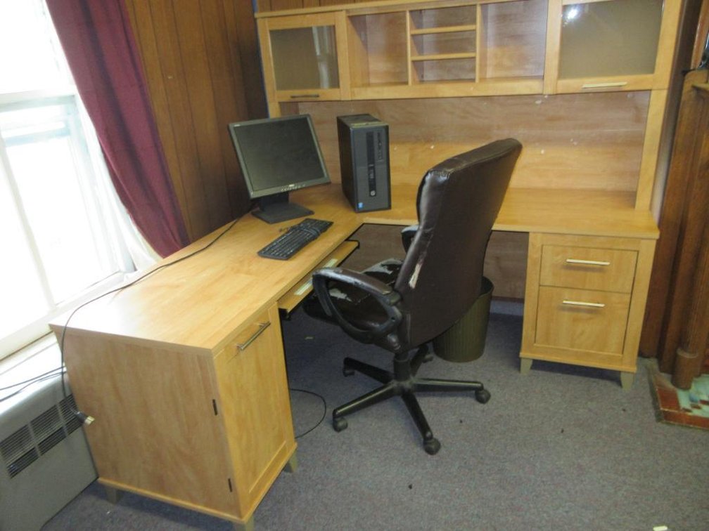 Corner office desk, chair and computer