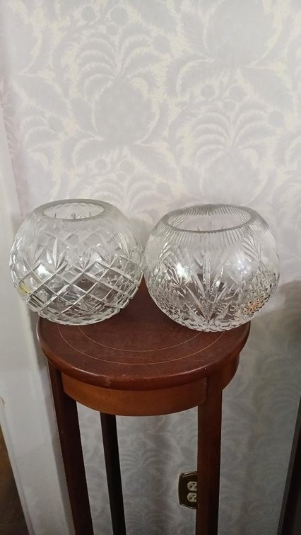2 clear cut glass globes