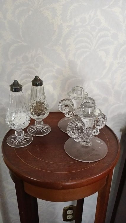 Clear glass salt and pepper shakers and candle holders