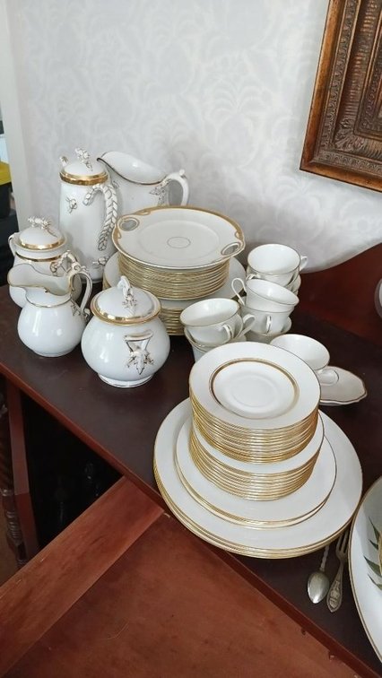 White dishes with gold trim