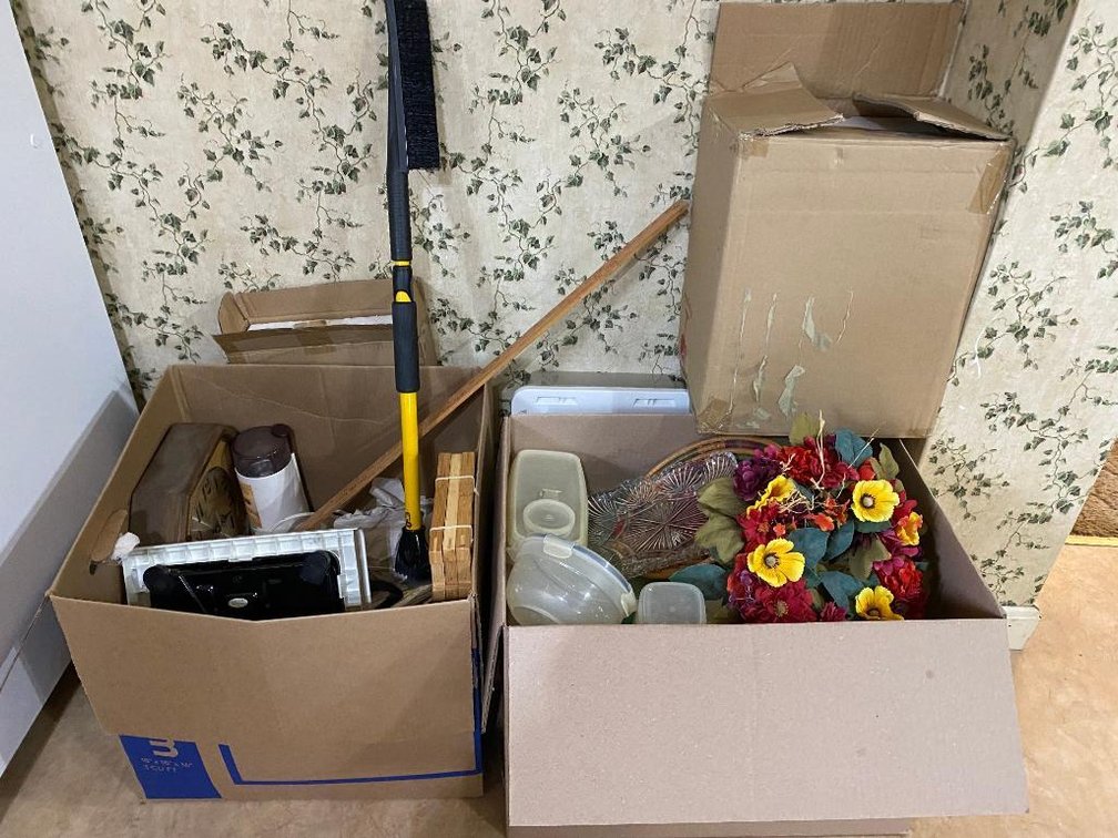 2 Boxes of Tupperware and decorator items