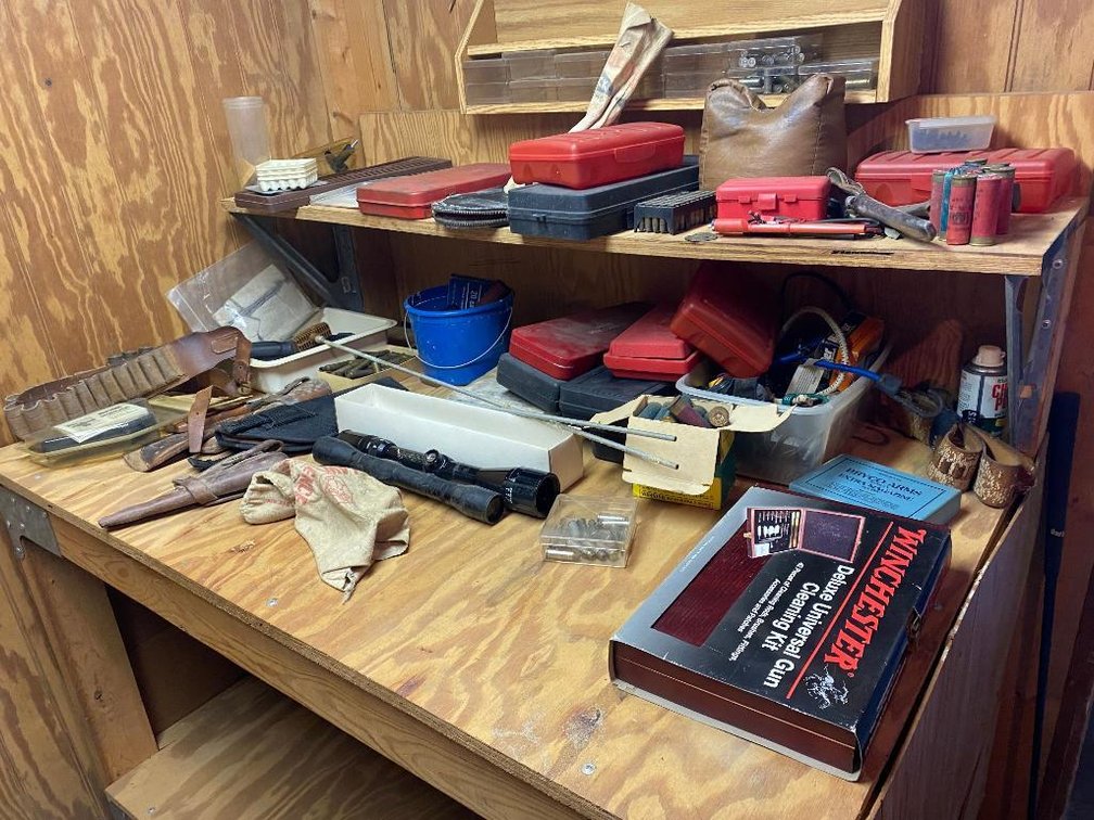 Lot of gun items:  Cleaning kits, holsters, scopes, etc.