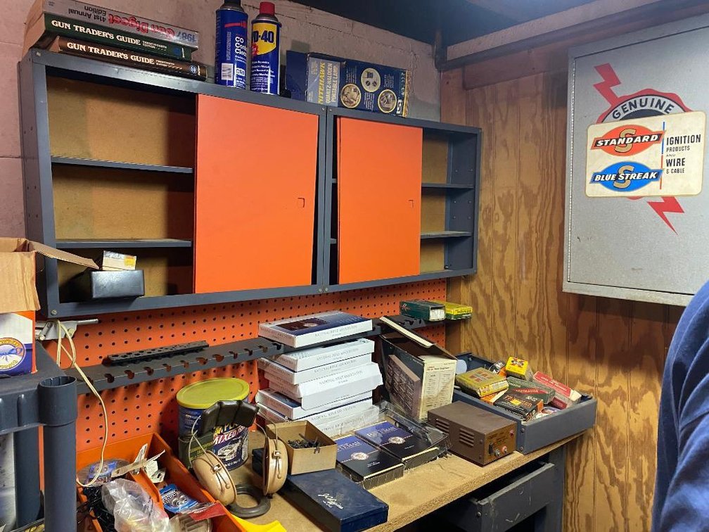 Metal shop cabinet and contents:  Reloading supplies, Rifleman video collection, bullets and a plastic side cabinet