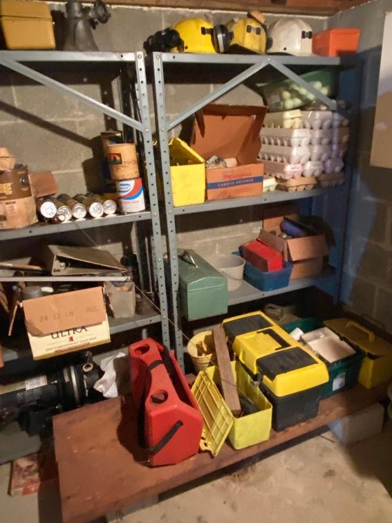 2 Metal shelves and contents: Golf balls, paints, hardware, sump pump - not tested
