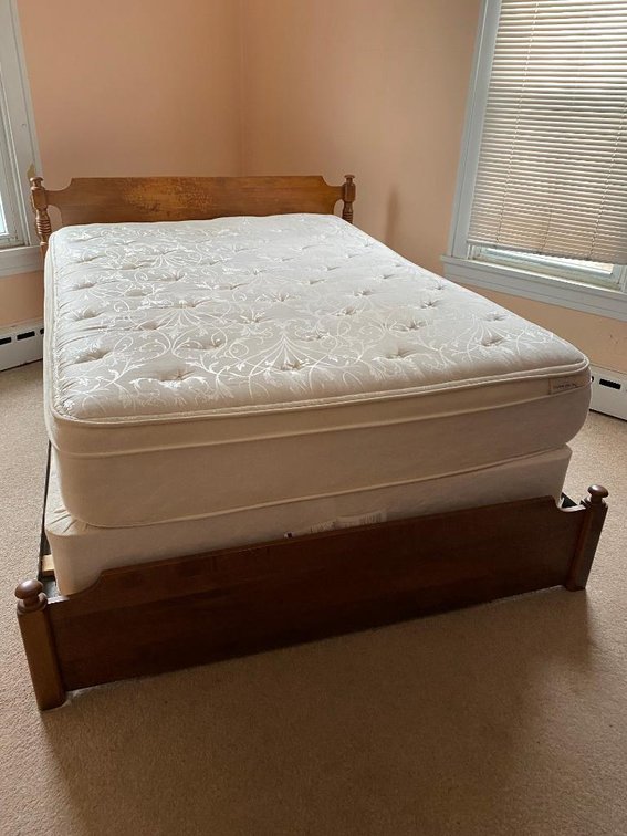 Wood headboard and footboard w/ bedding