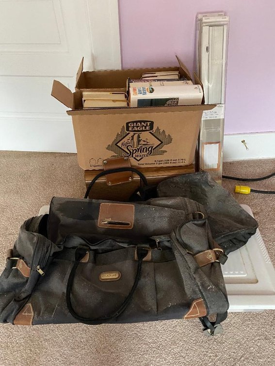 Lot of suitcases and books