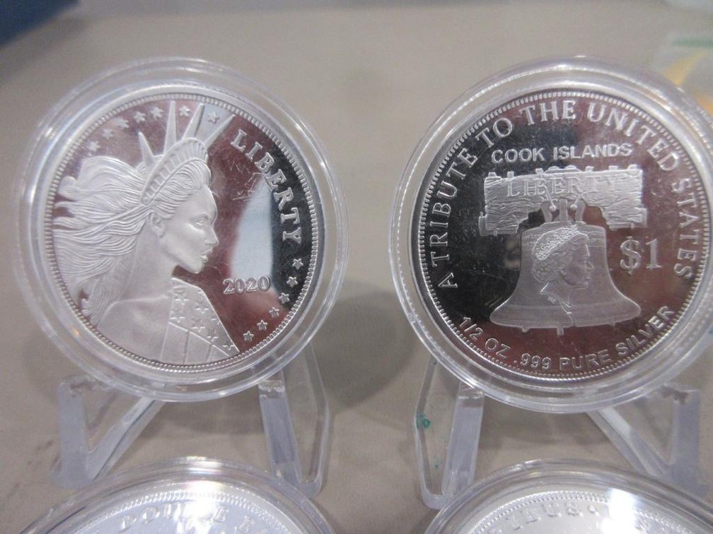 Seven .5 oz Silver rounds