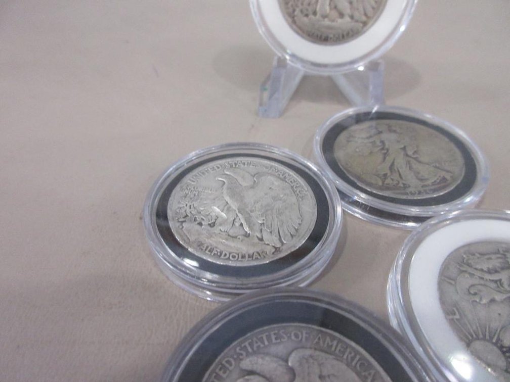 Five Walking Liberty US Half-dollars