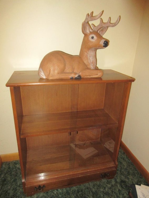 Deer statuette and shelf