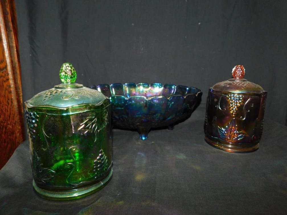 3 Pieces of carnival glass:  1 Footed bowl and 2 tobacco jars