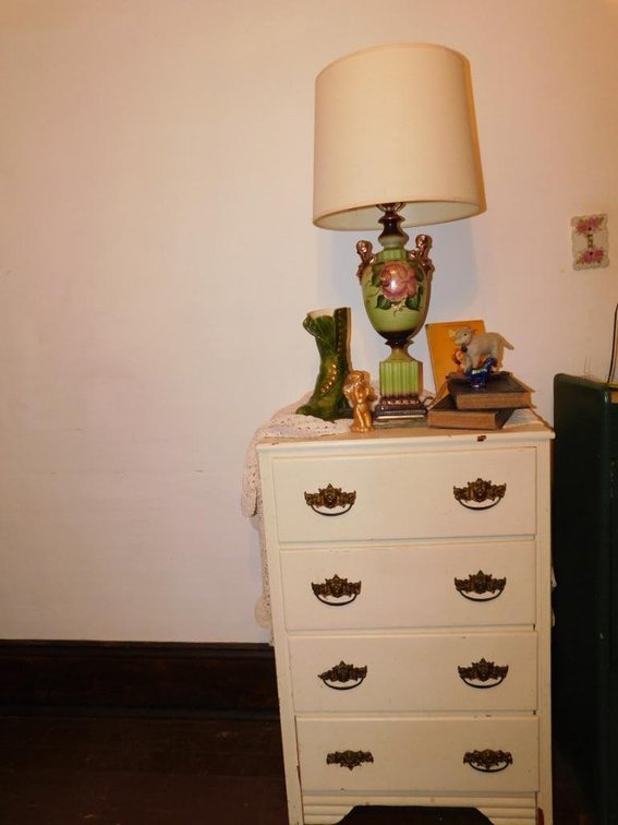 Small chest w/ lamp and decorative items