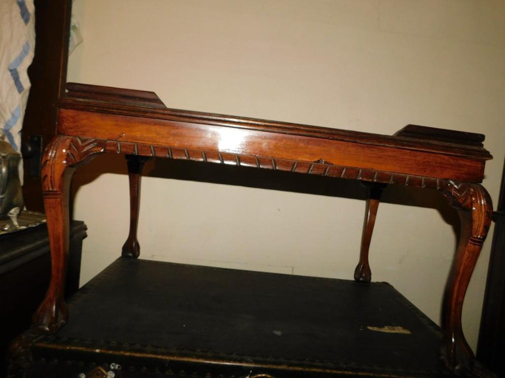 Fancy carved ball and claw foot table