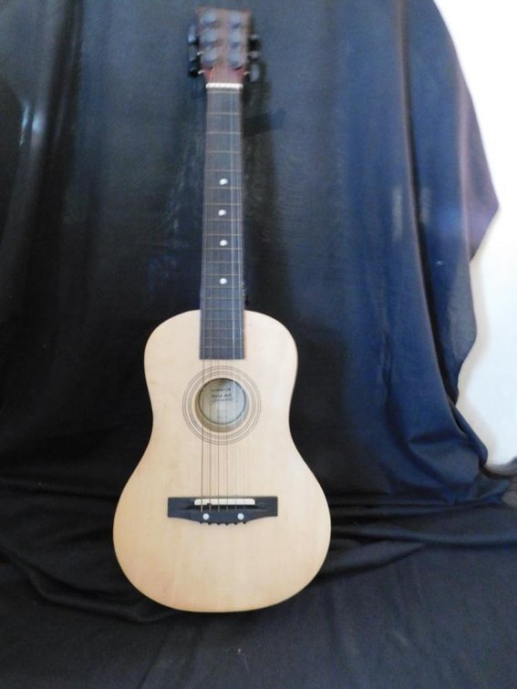 First Act child's guitar w/ strings