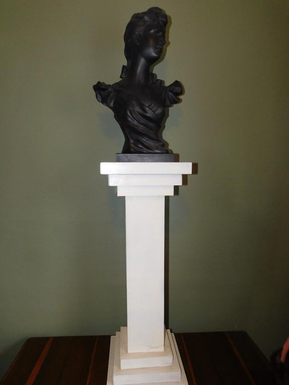Pedestal w/ Austin art piece by George Coudray