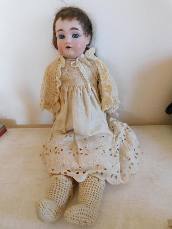 German doll w/kid skin body, teeth and sleepy eyes