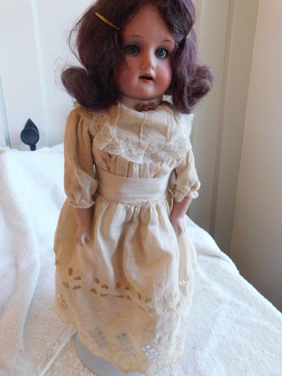 Sleepy eye doll w/ teeth, porcelain face