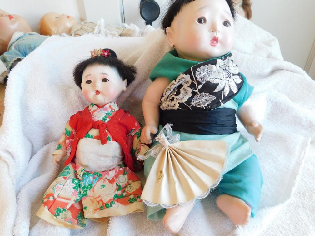 Composition oriental dolls