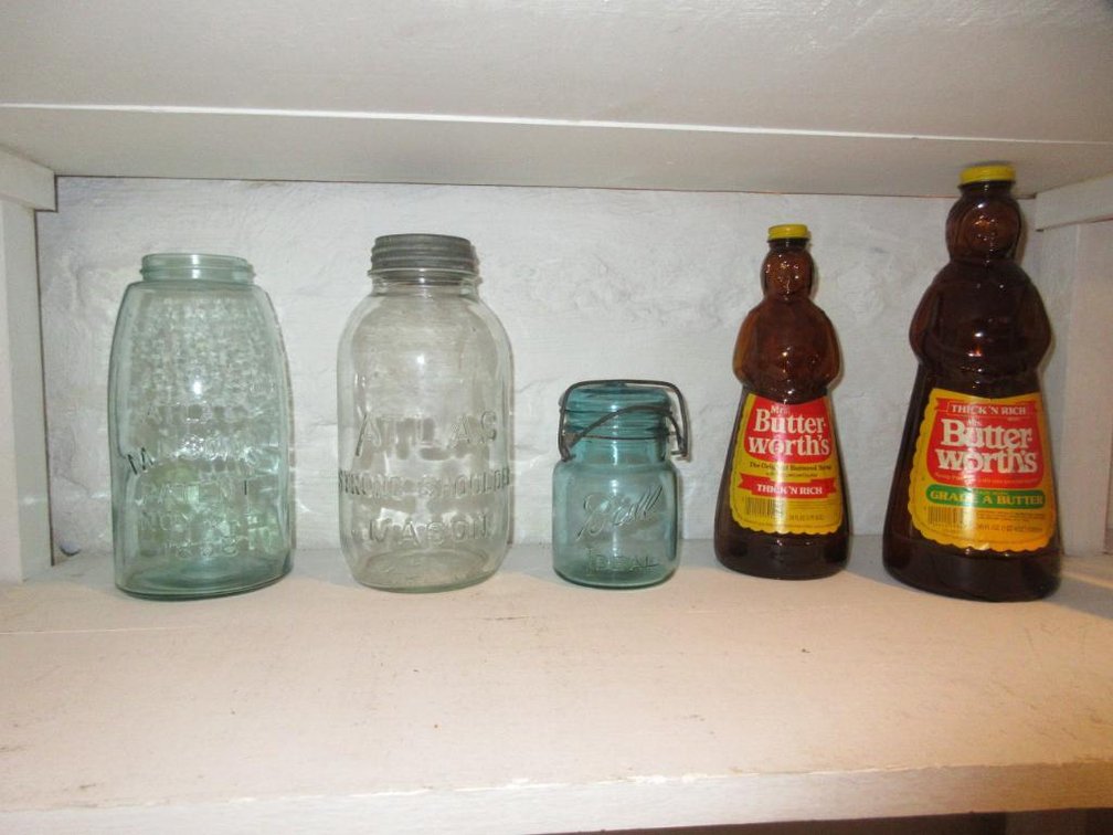 Mason jars and Mrs. Butterworth's bottles