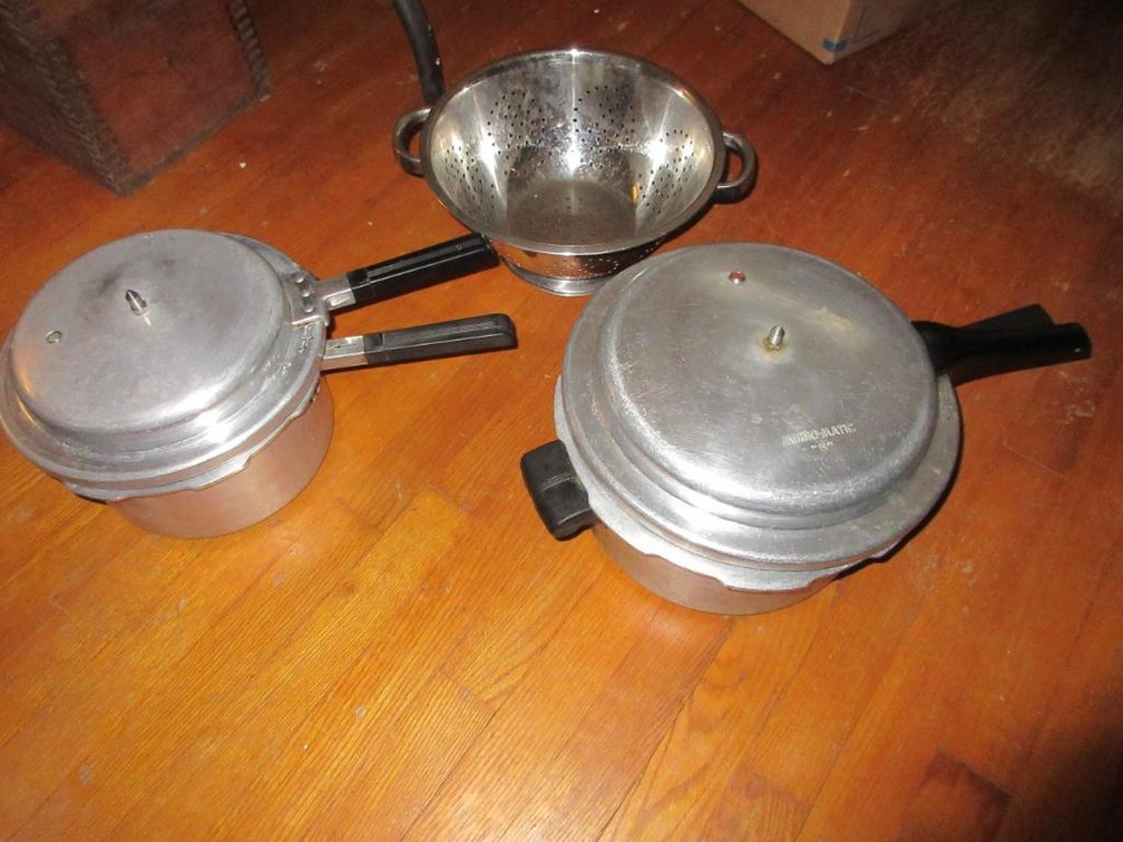 Mirro brand pressure cookers and colander