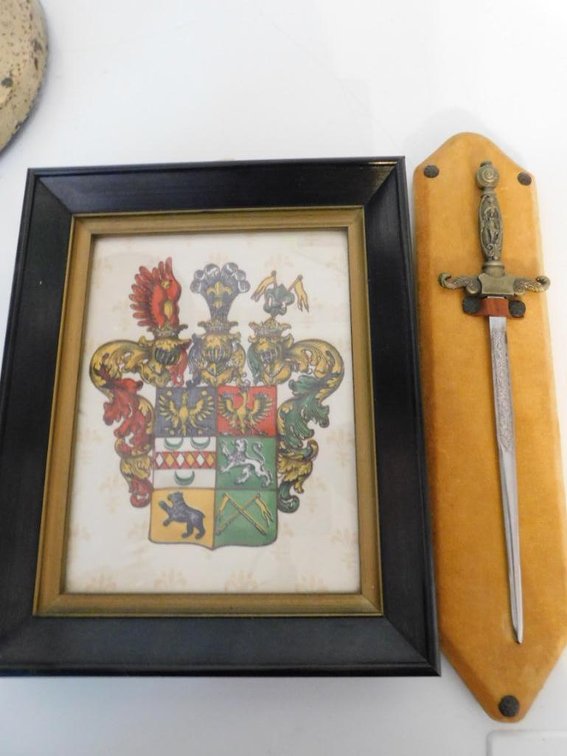 Framed coat of arms and letter opener