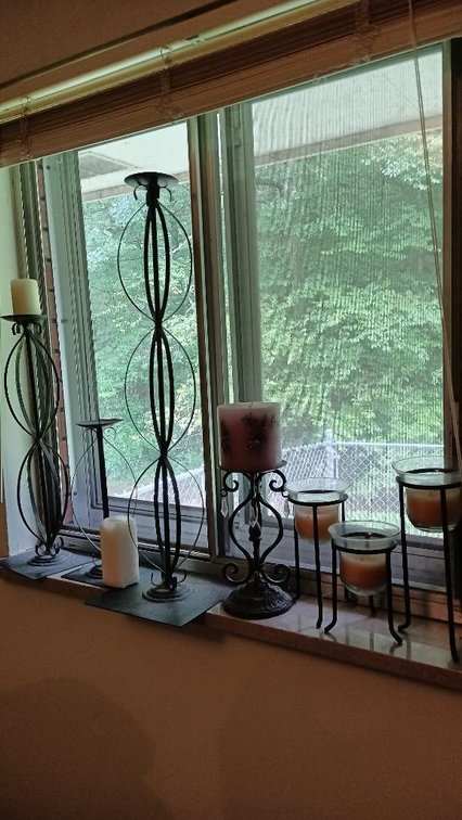 Assortment of candles and holders