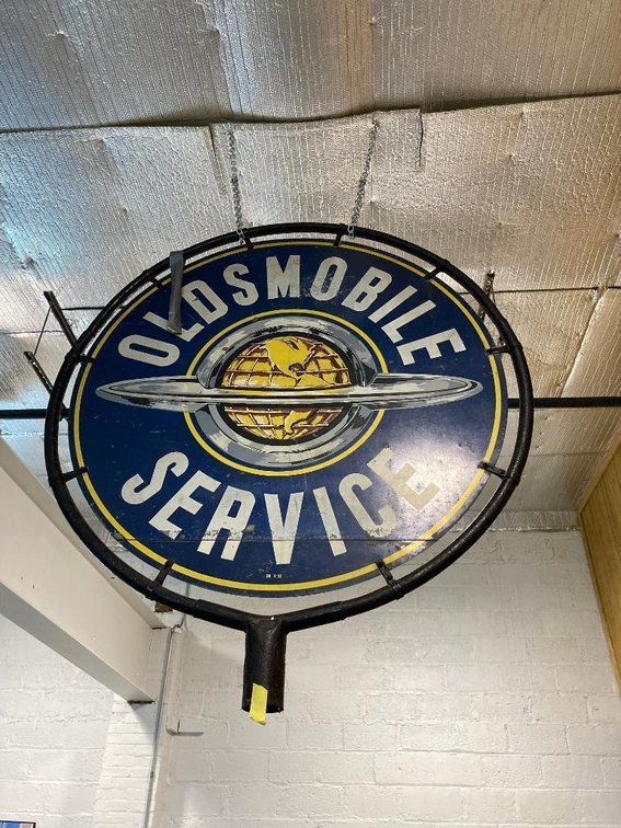 Oldsmobile service sign