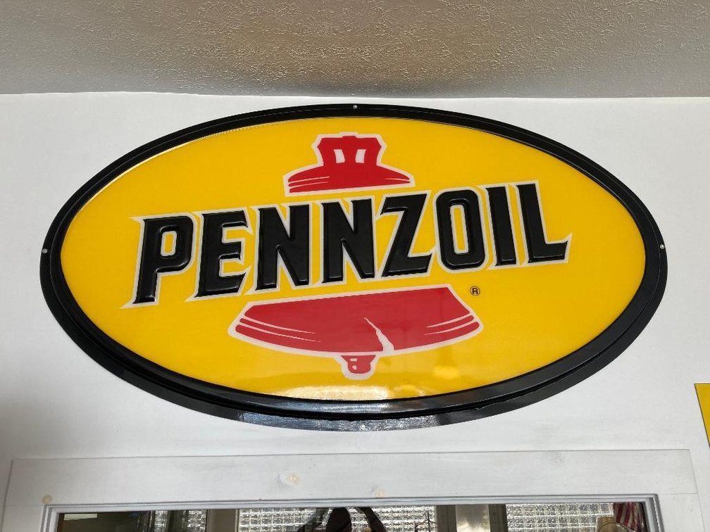 Pennzoil wall-mounted advertisement plastic sign