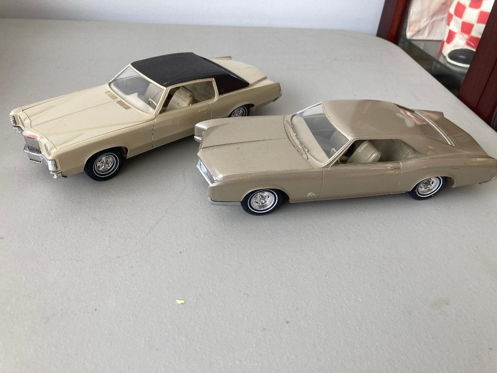 2 Promo cars:  '71 Grand Prix and '66 Riviera