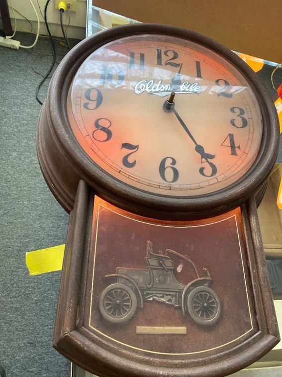 Oldsmobile electric plastic clock