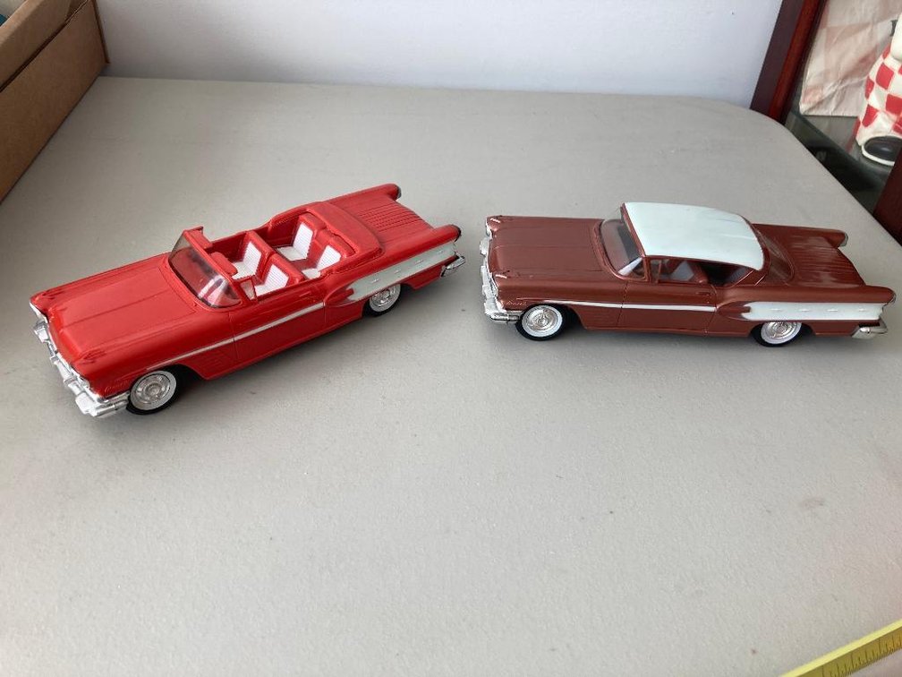 Two 1958 Pontiac Promos; one w/ minor damage