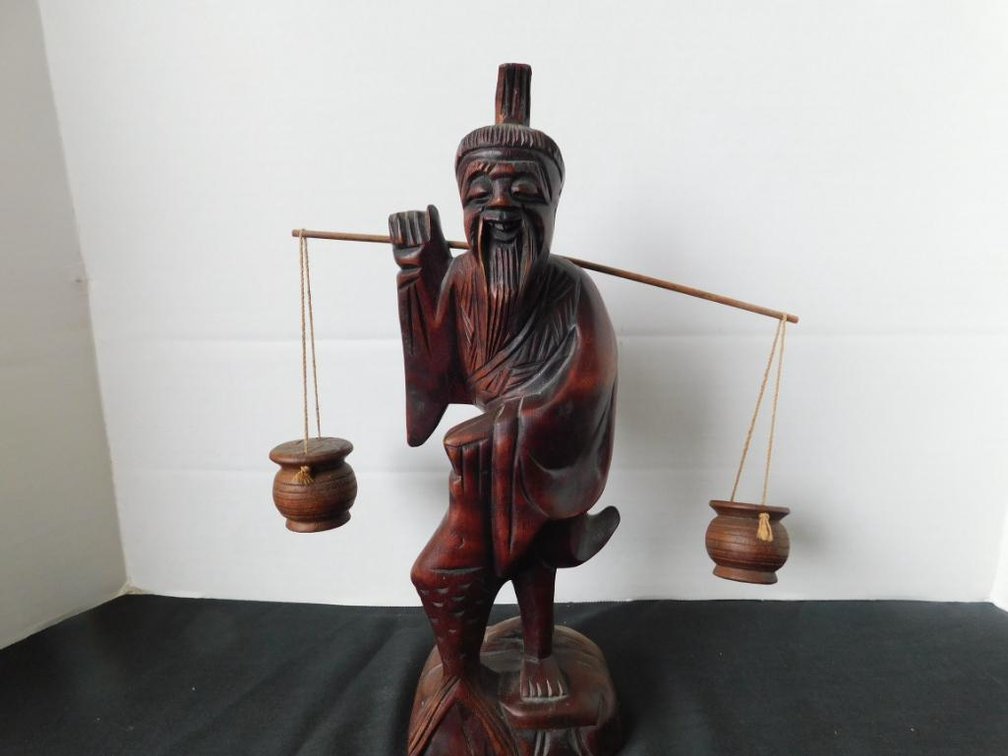 Carved oriental figurine
