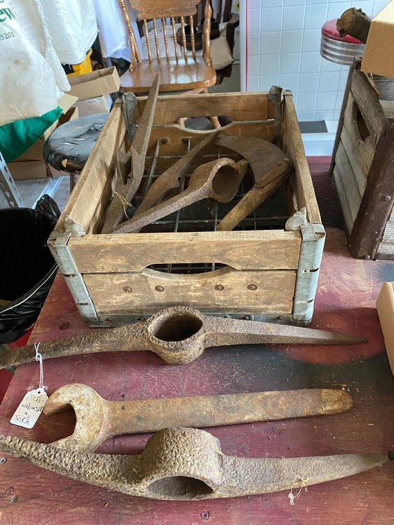 Lot of pick heads, wrenches and sickles