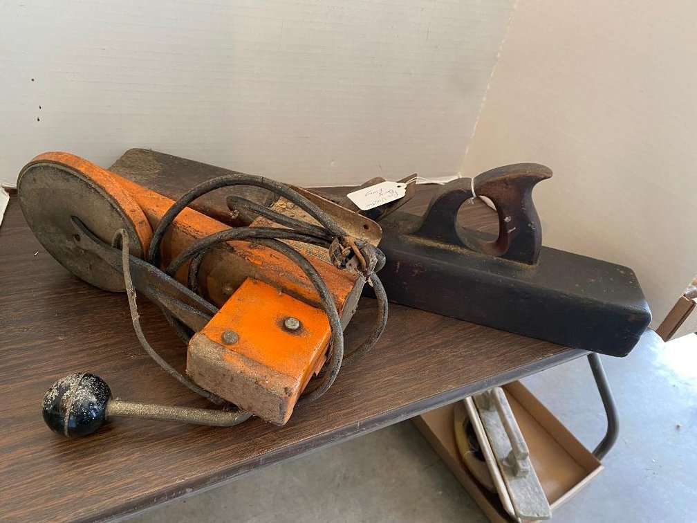 Antique block plane and handmade wall hanging from hardware