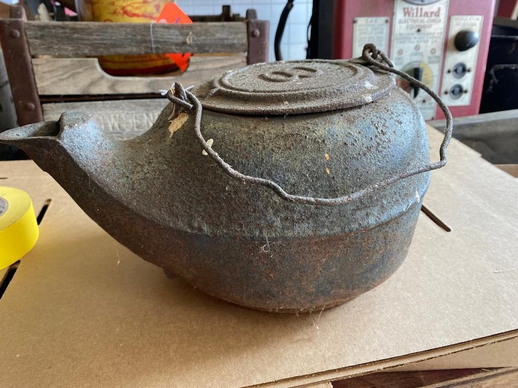 Cast iron teapot as found