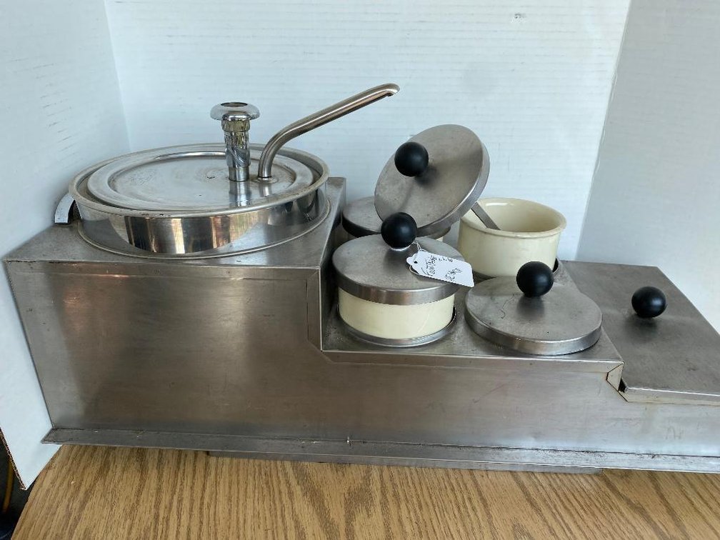 Fountainette by Helmco countertop display for milkshake and sundae flavorings