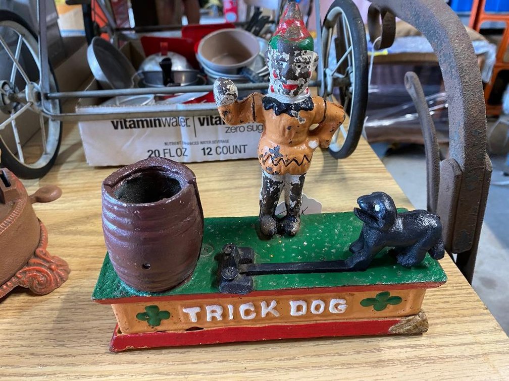 Mechanical trick dog bank