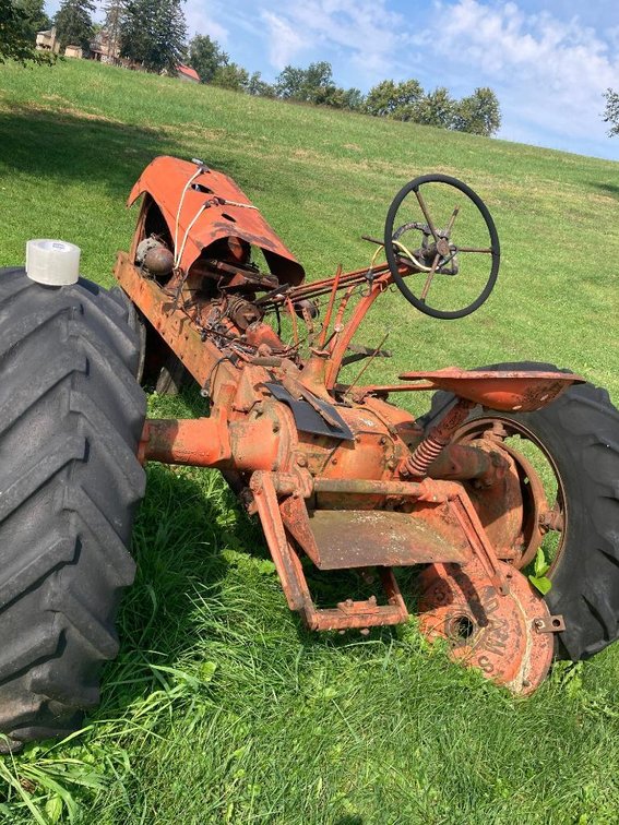 1950's Allis-Chalmers WD gasoline tractor w/ after market wheel weights; as shown