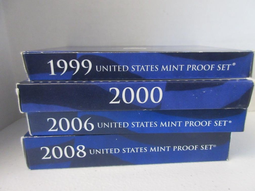 4 US Mint Presidential Dollar coin Proof Sets-three from 1999, 2000, 2006 and 2008