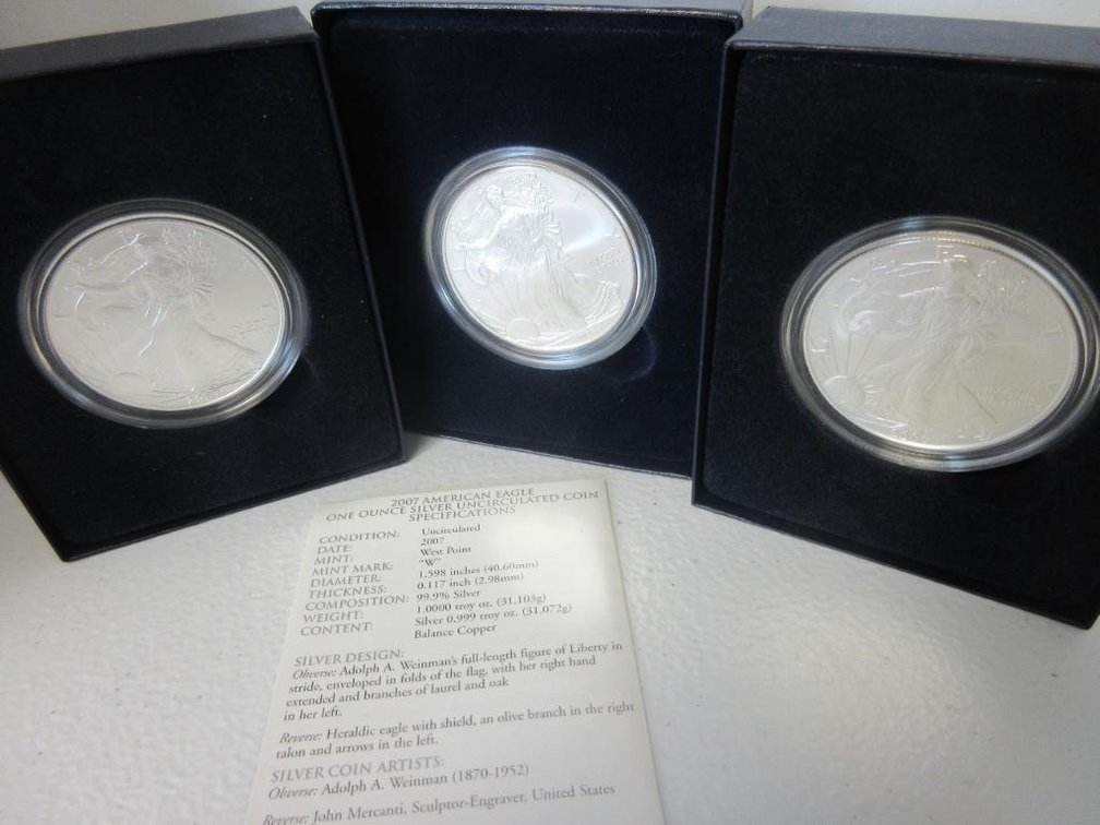 Three 1oz Uncirculated Silver American Eagle coins two 2007 and one 2008