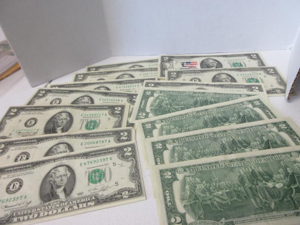 14 $2 US Bills