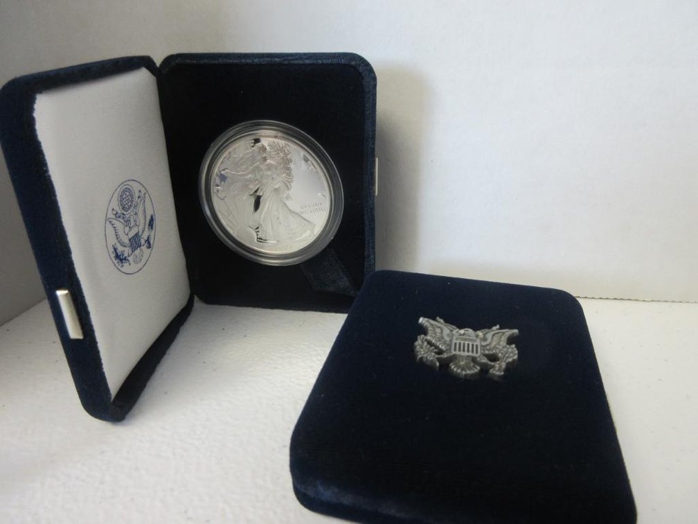 Two Silver American Eagle 1oz Uncirculated coins-one dated 2003 and one dated 2001