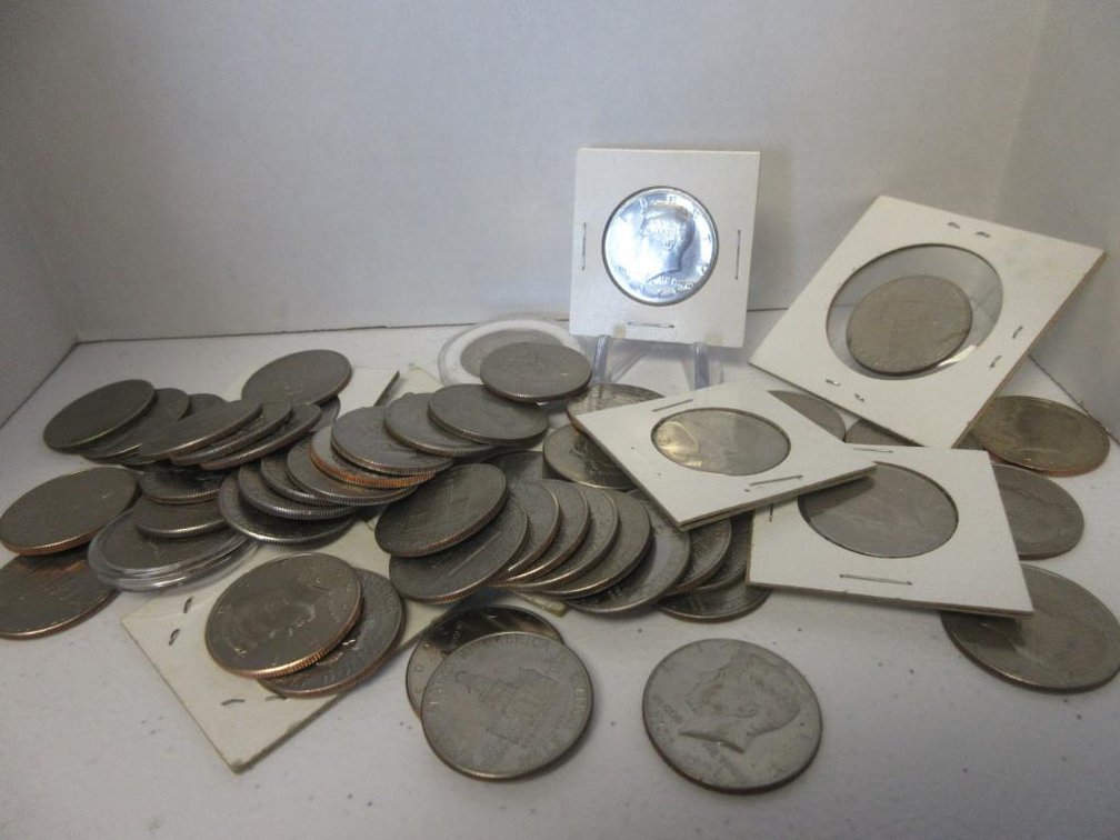 54 Kennedy Half-Dollars