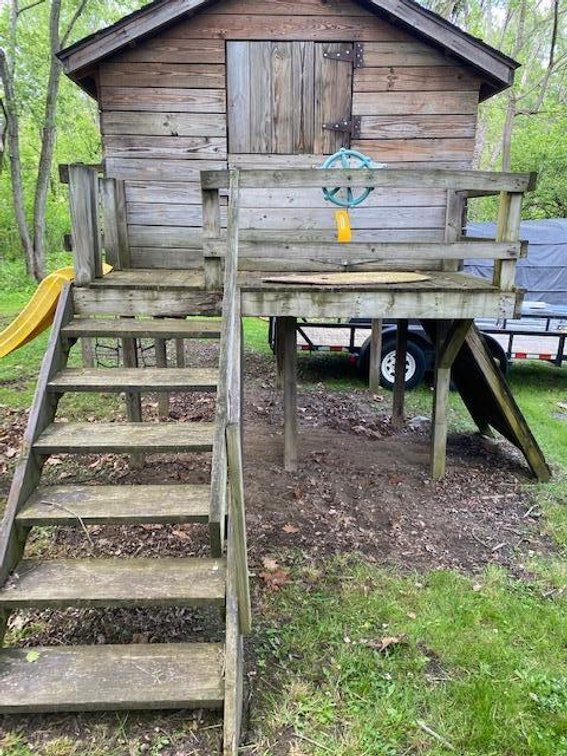 Child's playhouse w/ swing, extension, slide and walking wall; underneath items are NOT included