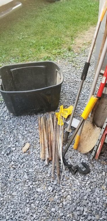 1 Lot of various hand tools:  Rakes, shovels, post hole digger, mattock, etc.