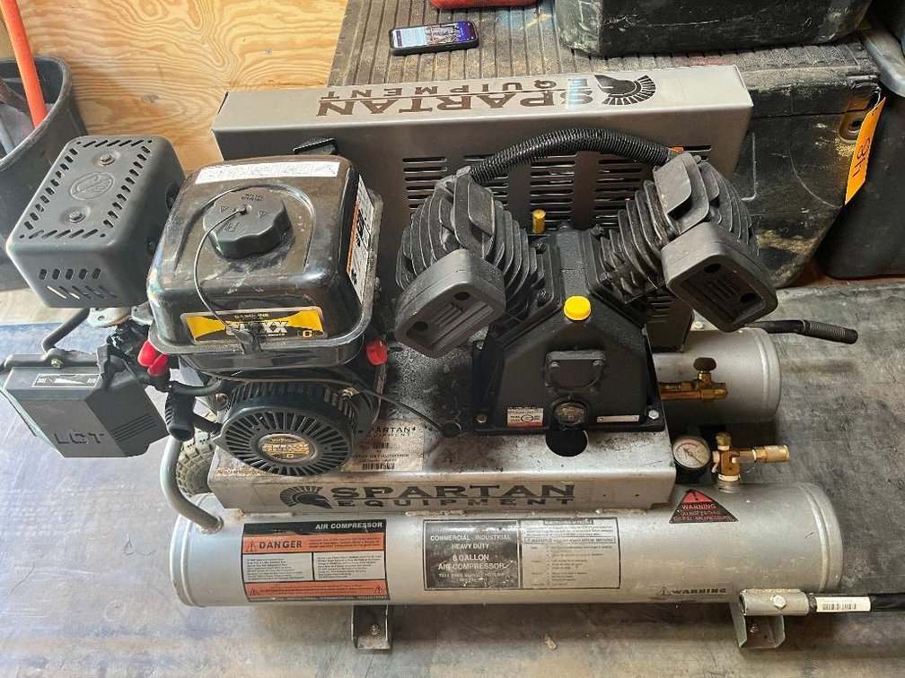 Spartan Equipment wheelbarrow style twin cylinder gasoline-operated air compressor