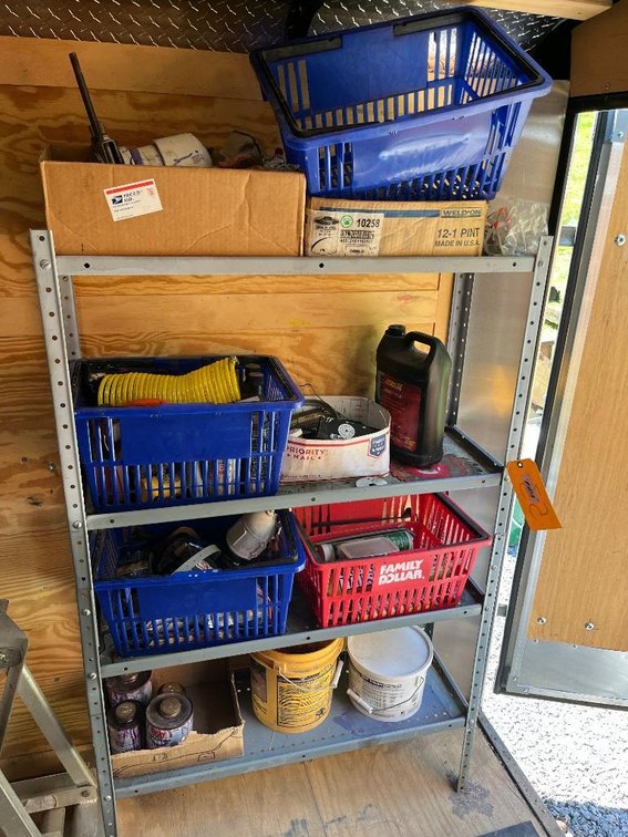 Metal shelf and contents:  Caulking, grease, Quikrete, buckets w/ plugs, PVC primer and glue, etc.