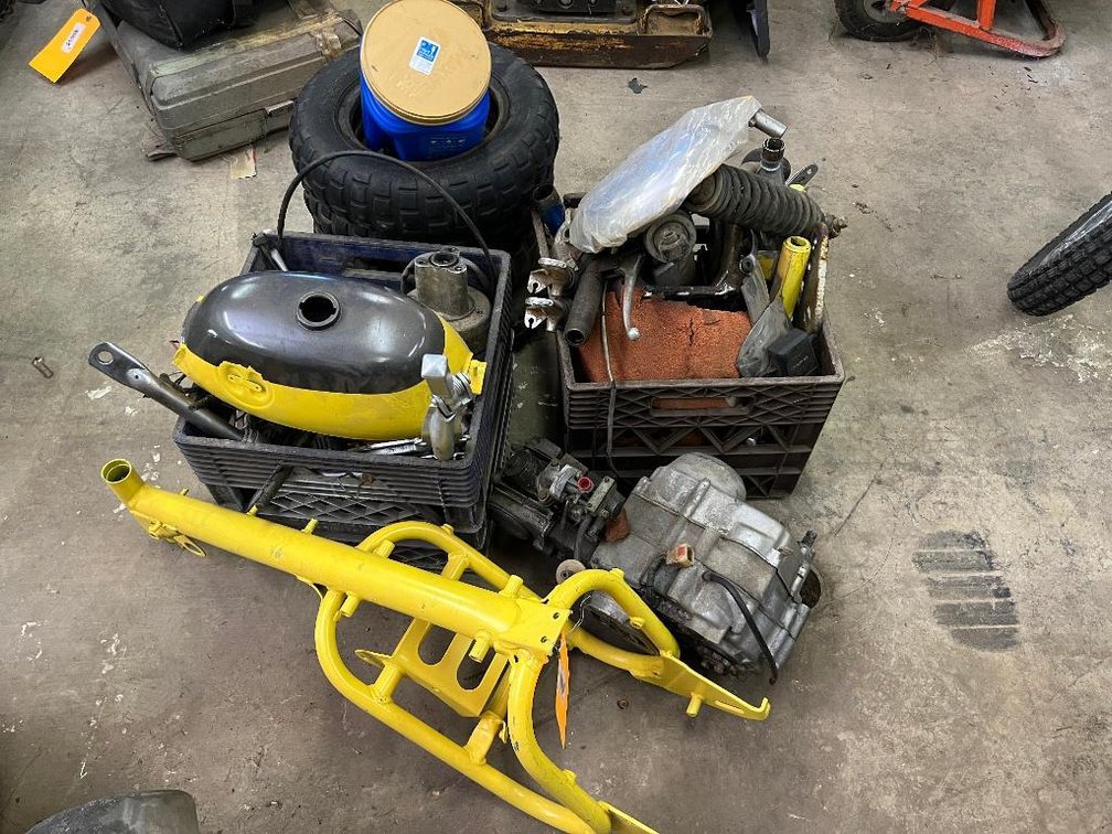 Honda Mini Trail bike in pieces; motor, frame, 4 tires, 2 crates of parts, gas tank