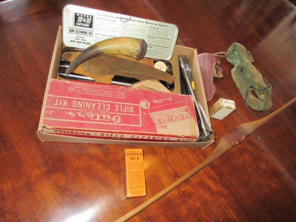 Powder horn, gun cleaning supplies and other accessories