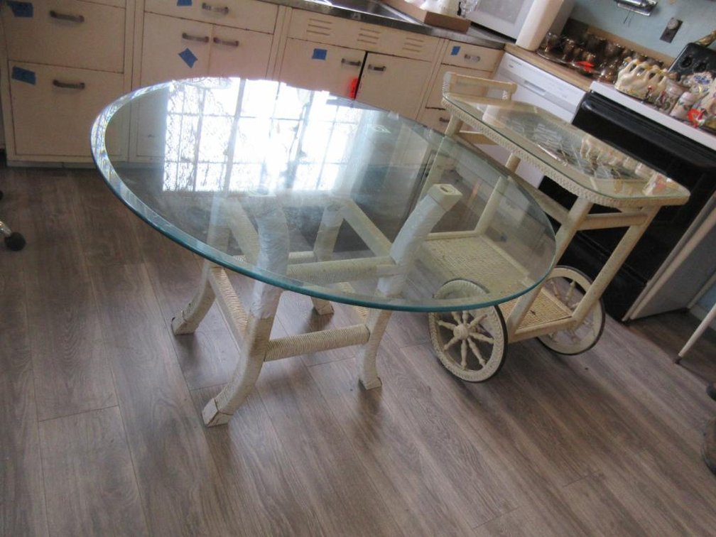 Wicker glass top dining room table and wicker glass top microwave cart