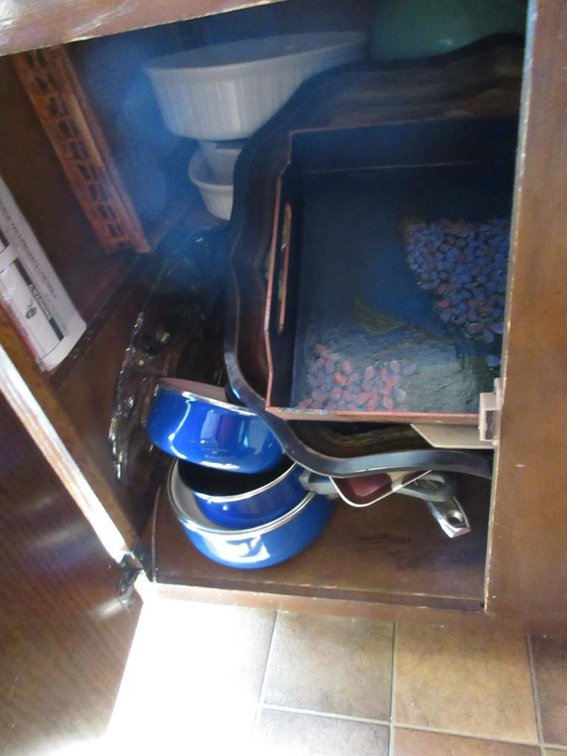 contents in bottom of kitchen cabinets